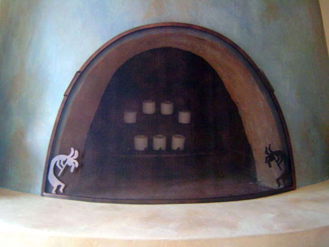 Beehive fireplace screen with Kokopelli